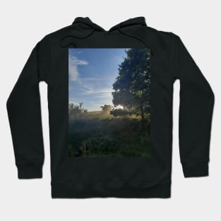 Combine harvester at sunset Cap Hoodie